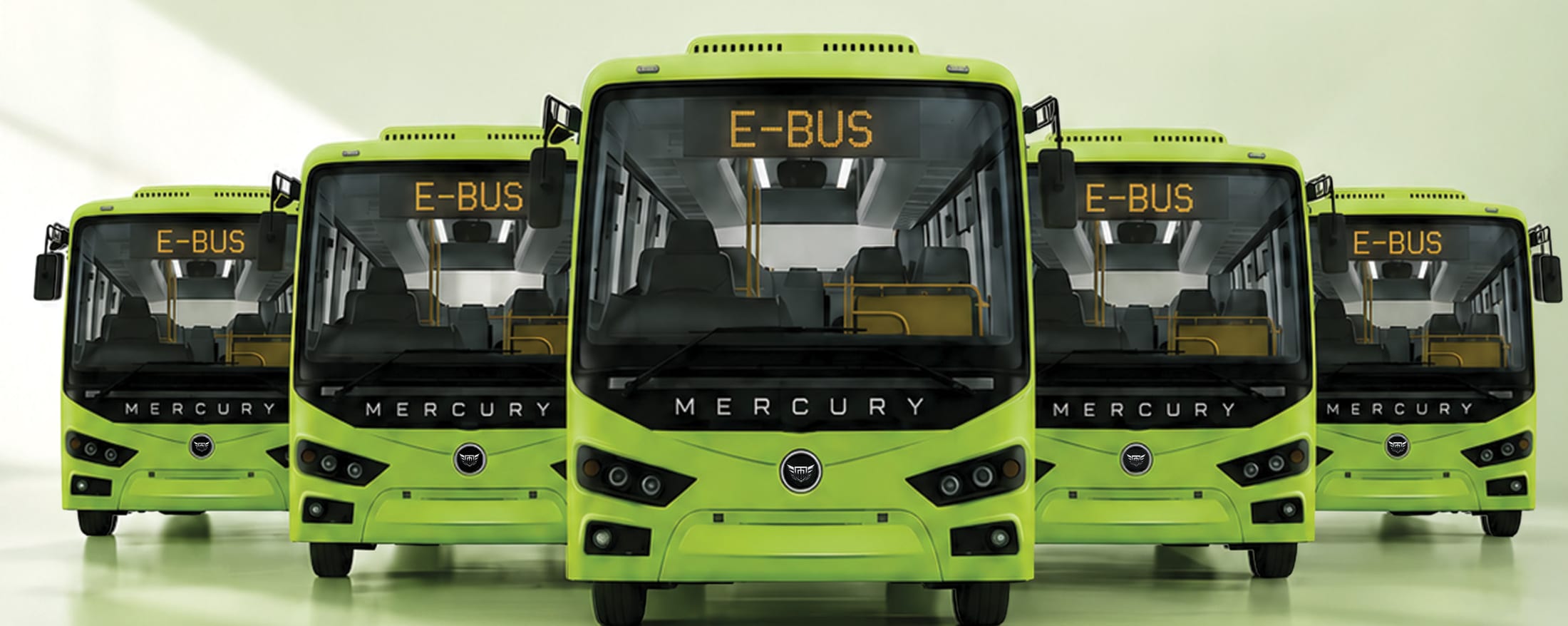 Five Mercury electric buses lined up head-on in a studio